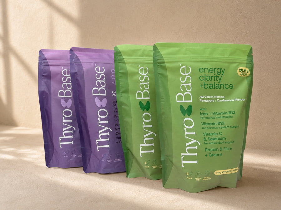 Four ThyroBase pouches, two AM and two PM, on warm sand.