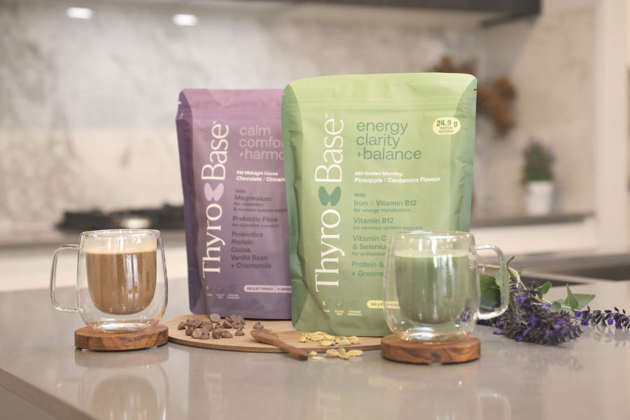 ThyroBase AM and PM pouches on a kitchen bench with two prepared drinks