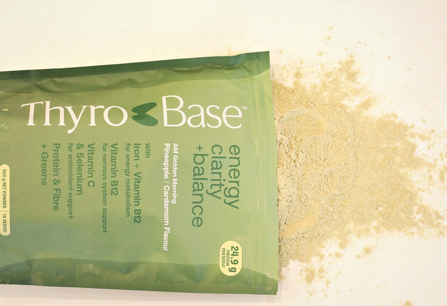 ThyroBase AM pouch with a spill of golden powder